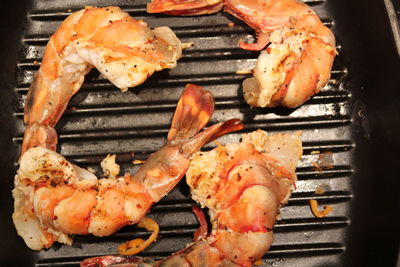 Close-up of meat on barbecue grill