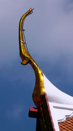 Low angle view of statue against sky