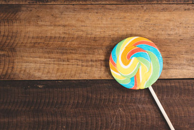 High angle view of ice cream on wooden table