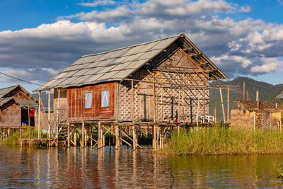 A traditional stilt house in water of inle lake in myanmar in the shan state of former burma