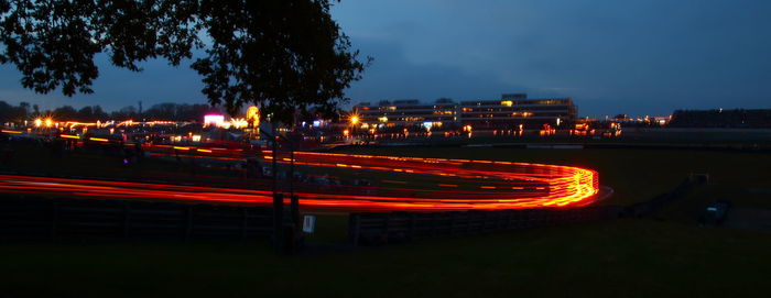 Light trails on street in city at night