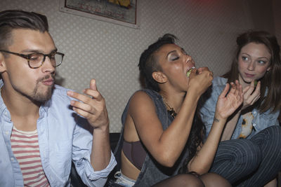 Young couple eating food