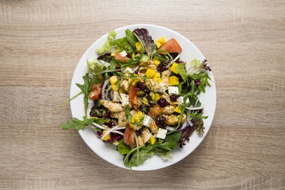 High angle view of salad in bowl on table