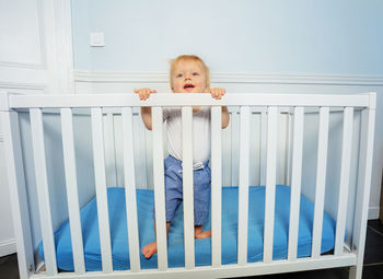 Portrait of cute baby boy looking away