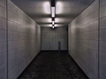 Empty illuminated passage in building