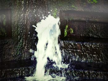 Close-up of waterfall in forest