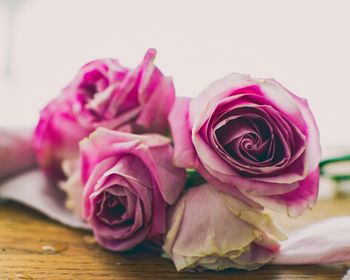 Close-up of pink rose bouquet on table