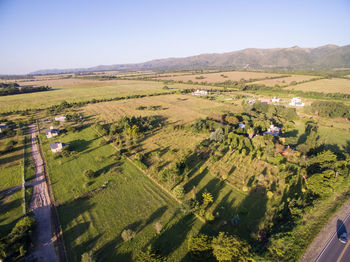 High angle view of agricultural field against clear sky