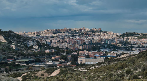 High angle shot of townscape against sky
