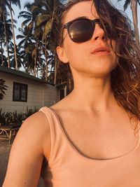 Portrait of young woman wearing sunglasses