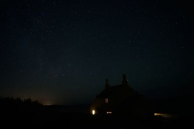 Scenic view of star field against sky at night