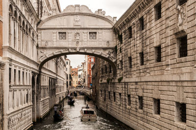 Bridge of sighs over canal in city