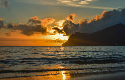 Scenic view of sea against sky during sunset