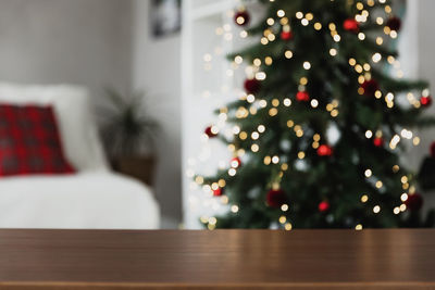 Close-up of wooden table at home