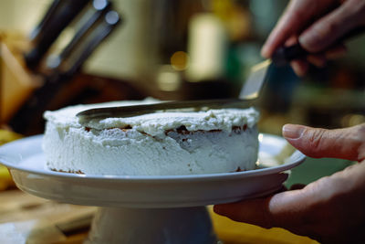 Midsection of person holding ice cream