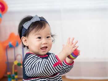 Portrait of cute smiling girl