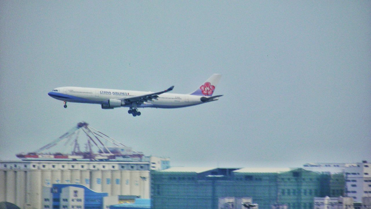 AIRPLANE FLYING IN SKY