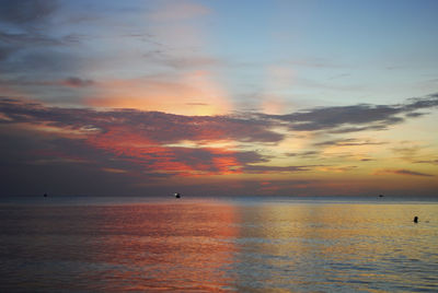 View of calm sea at sunset