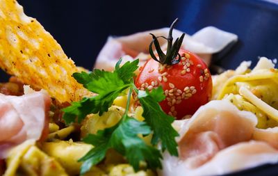 Close-up of chopped fruit salad in plate