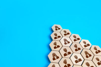 Close-up of dices against blue background