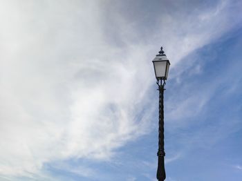 Low angle view of street light against sky