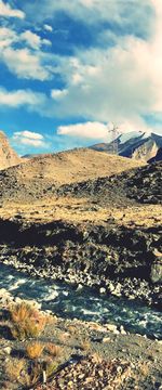 Scenic view of land against sky