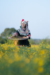 View of yellow flower on field