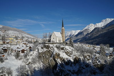 Panoramic view of buildings against sky during winter
