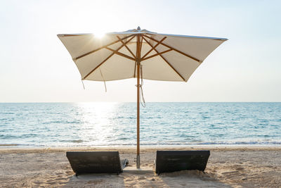 Bed pool on the beach at the sea for summer holiday