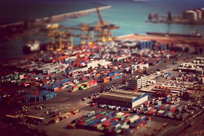 Tilt-shift image of cargo containers at harbor