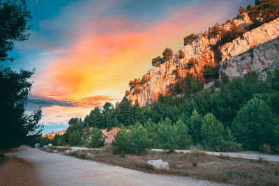 Scenic view of landscape against sky during sunset