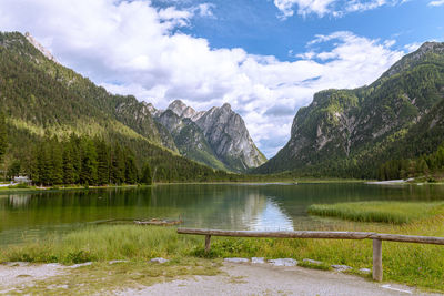View of toblacher see, lake in the north italy, in the background the dolomites.
