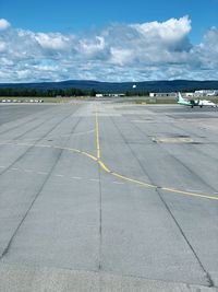 View of airport runway against sky