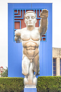 Statue against blue sky