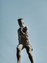 Low angle view of statue against clear sky