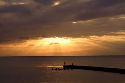 Scenic view of sea during sunset