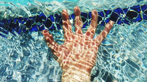 Reflection of woman in water