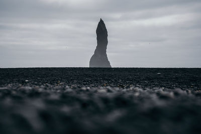 Amazing sight at a cloudy day from black sand beach, iceland