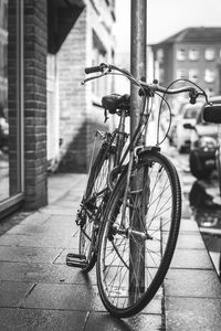 Close-up of bicycle in city
