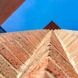 Tall built structure against clear blue sky