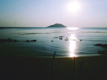 Scenic view of sea against sky at sunset