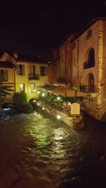 View of canal at night