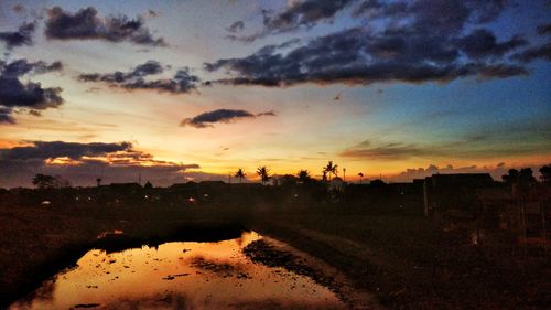 Scenic view of silhouette landscape against sky during sunset