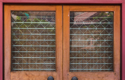 Closed window of old building