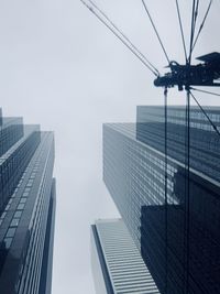 Low angle view of modern building against clear sky