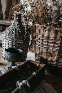 Close-up of wicker basket hanging on tree