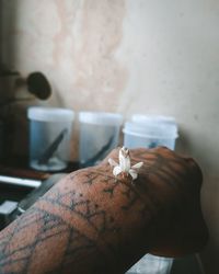 Close-up of woman holding hands