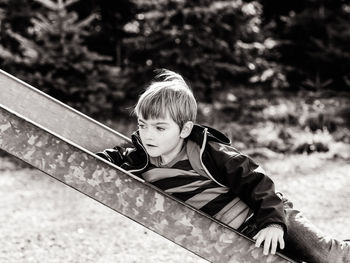 Boy on slide at playground