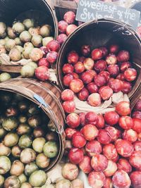 High angle view of apples in basket for sale