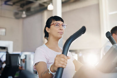 Woman exercising at gym